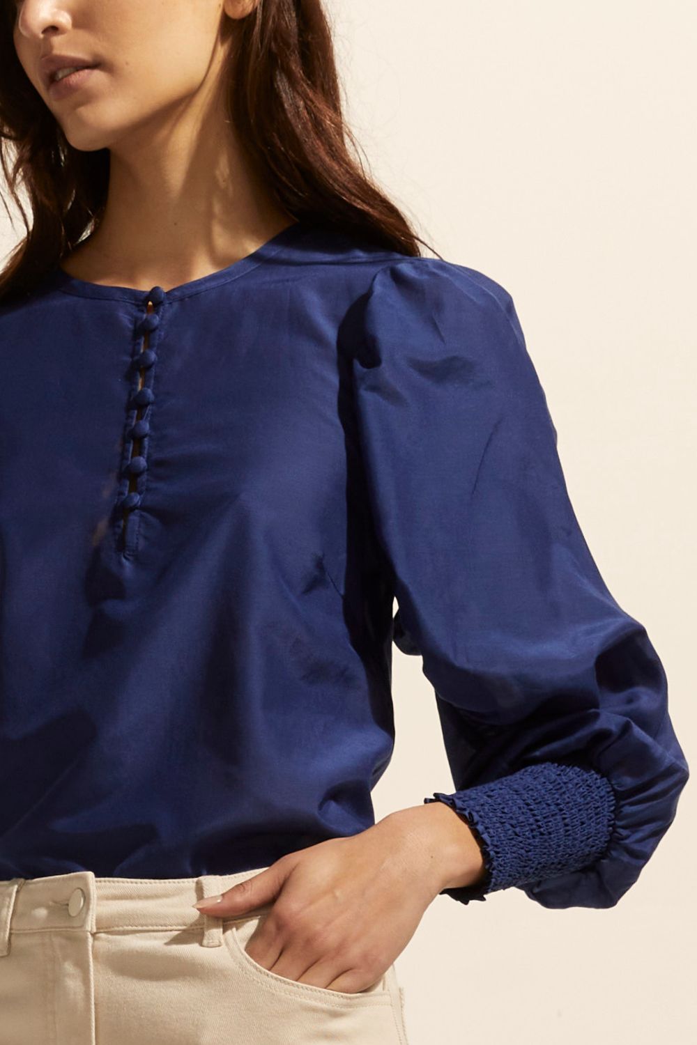 slate blue, blue, top, long sleeve, shirred cuffs, blouson sleeve, covered buttons round neckline, detail image