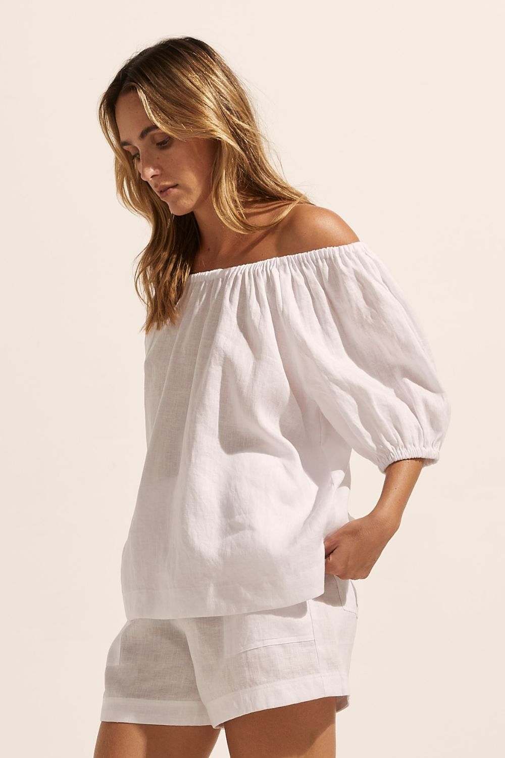 white, top, off-the-shoulder, mid-length sleeve, small side splits, elasticated sleeve cuff, tie at back, side image