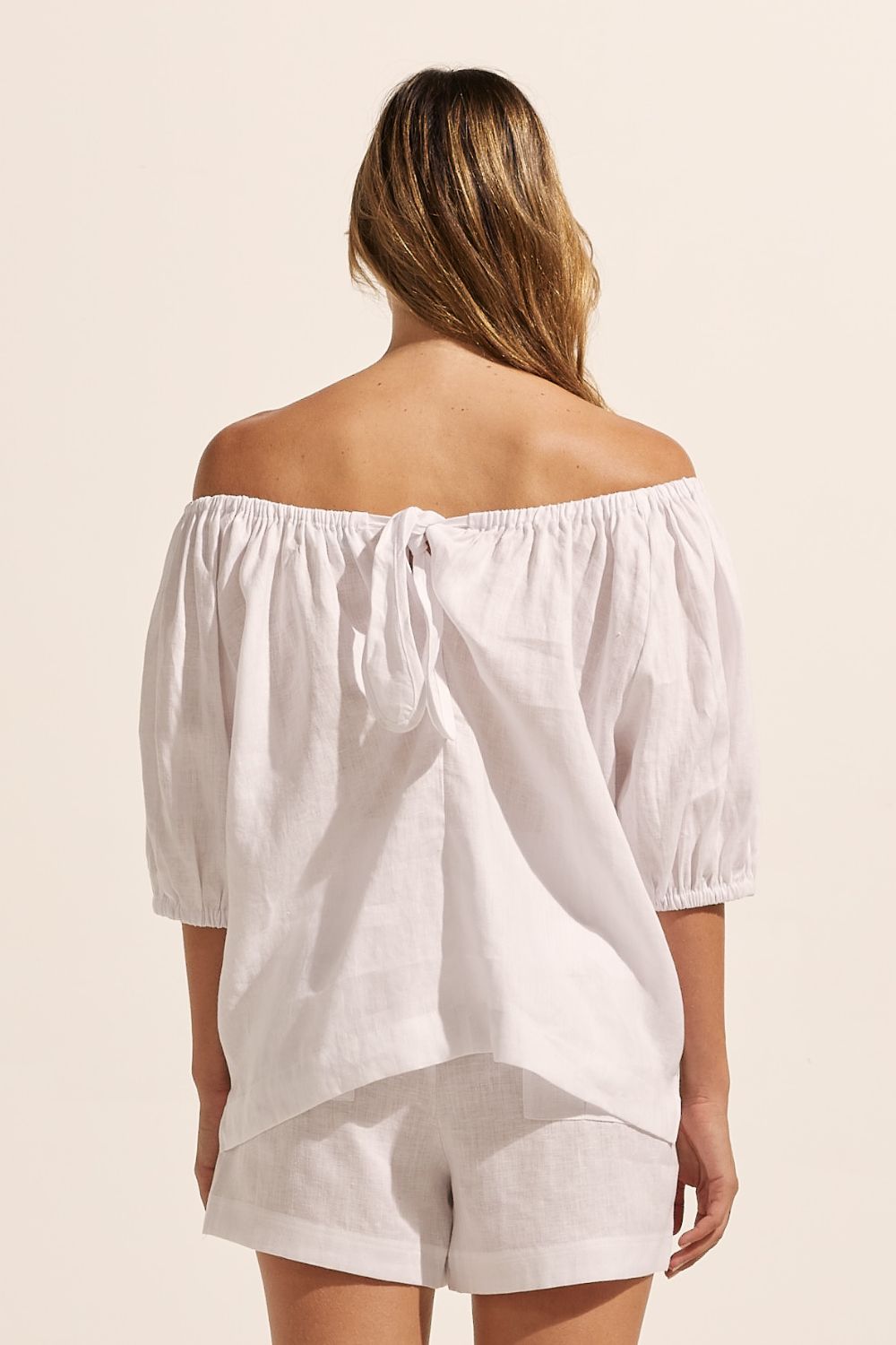 white, top, off-the-shoulder, mid-length sleeve, small side splits, elasticated sleeve cuff, tie at back, back image