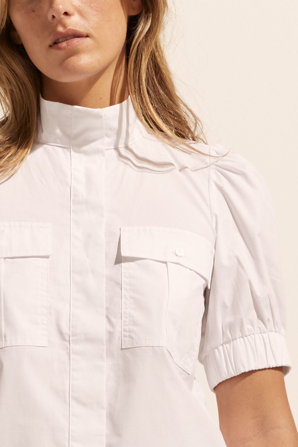 white, high neck, button up shirt, top, close up view