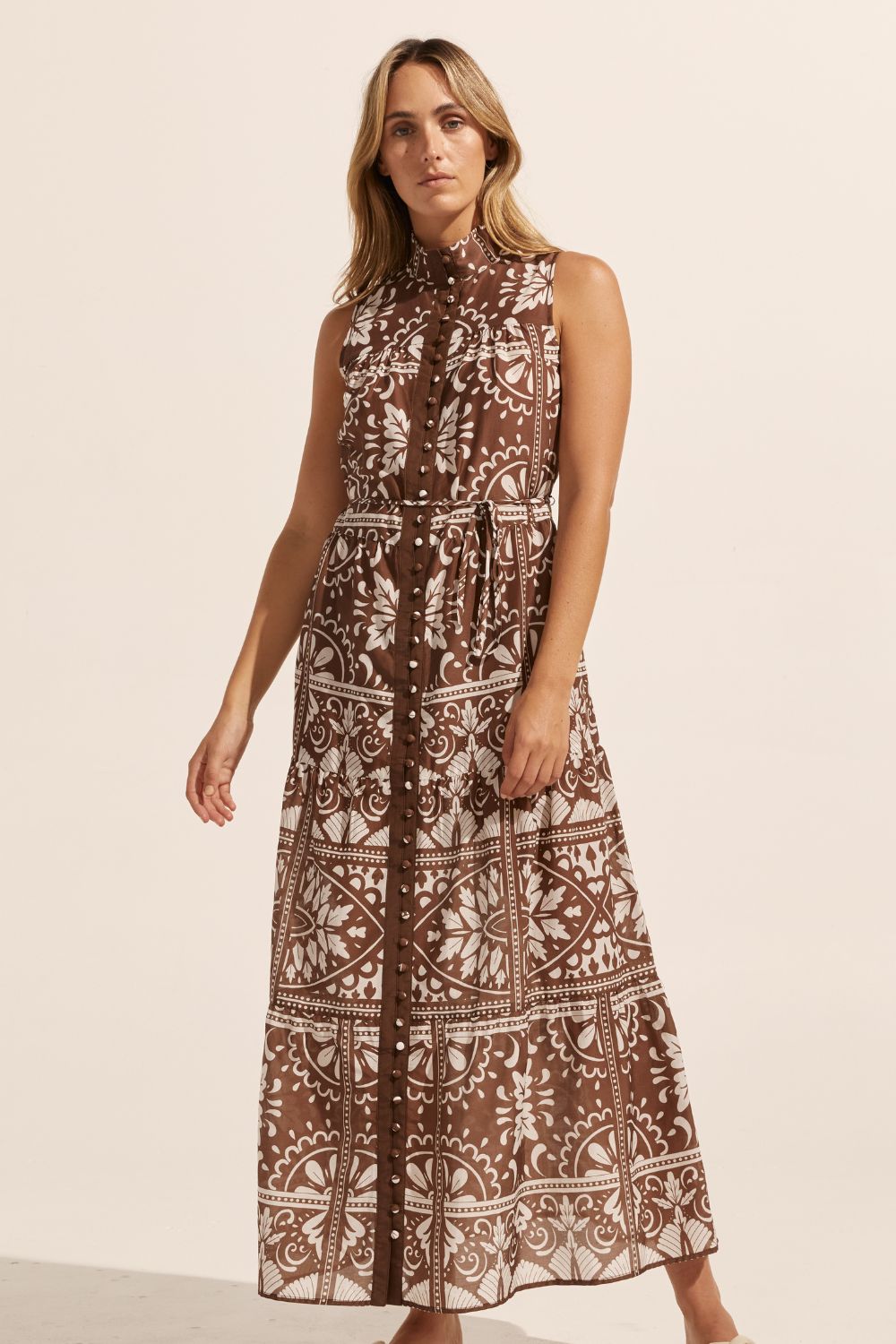 brown and white print, high neck, buttons down centre, thin fabric belt, sleeveless, dress