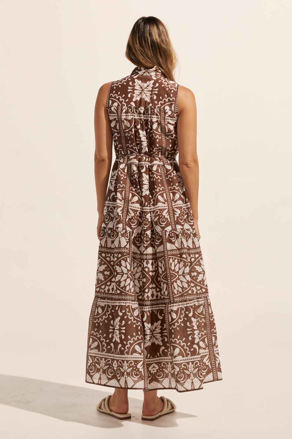 brown and white print, high neck, buttons down centre, thin fabric belt, sleeveless, dress, back view