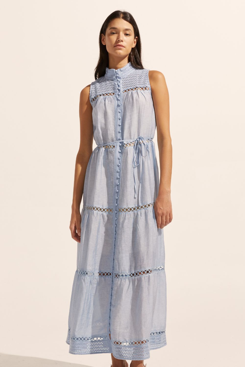 blue, maxi dress, sleeveless, button down centre, high neck, circular lace design, self tie fabric belt, front image