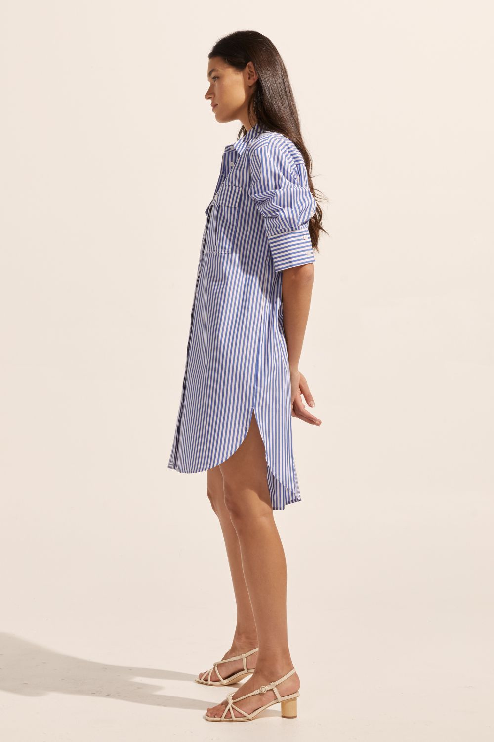 blue and white stripe, mid length sleeve, oversized patch pockets, high-low hemline, buttons down centre, crisp collar, dress, side image