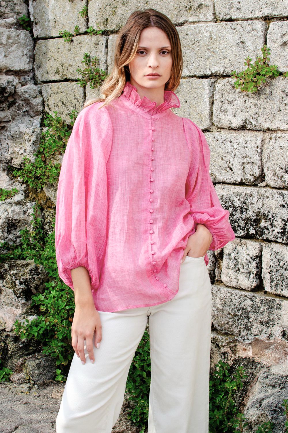 pink, covered buttons, voluminous sleeve, high neck, ruffle collar, mid length sleeve, elasticated cuff, top, campaign image