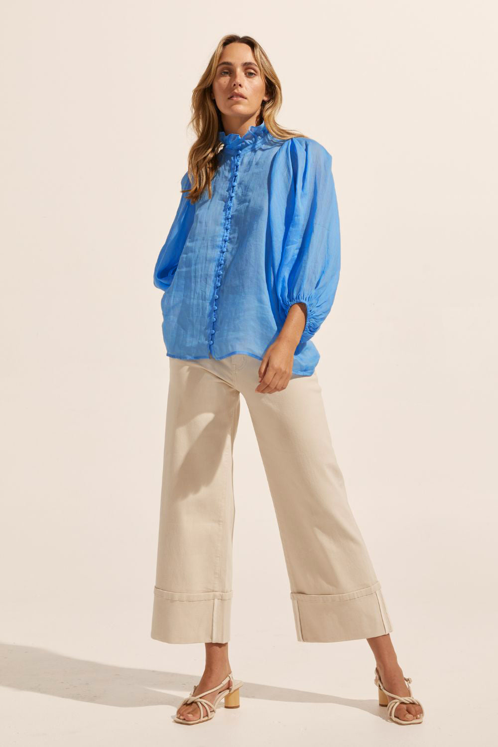 blue, ruffle neck collar, buttons down centre, mid length sleeve, shirt, front view