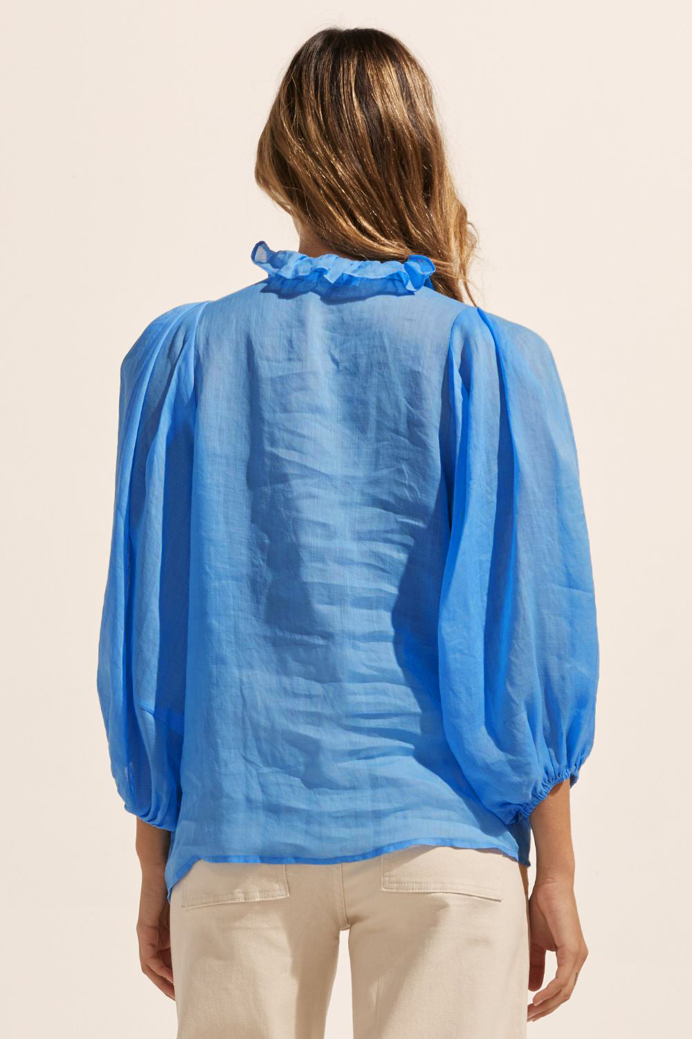 blue, ruffle neck collar, buttons down centre, mid length sleeve, shirt, back view