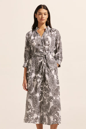 black and white print, self tie fabric belt, high neck, mid length sleeve, midi dress, side pockets, front view