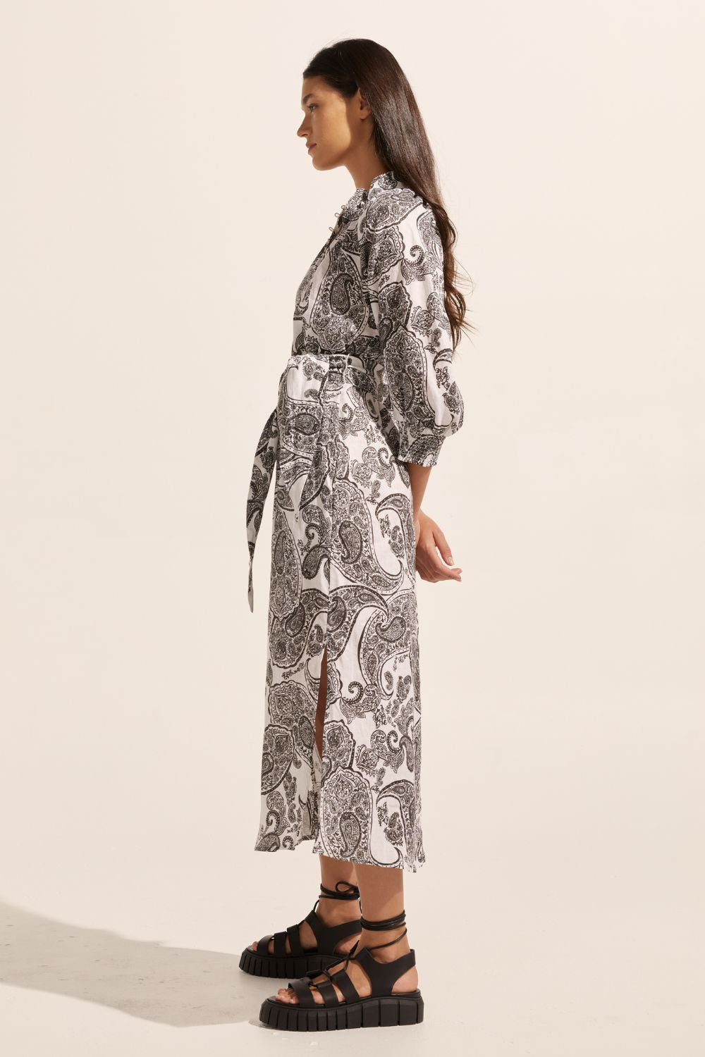 black and white print, self tie fabric belt, high neck, mid length sleeve, midi dress, side pockets, side view