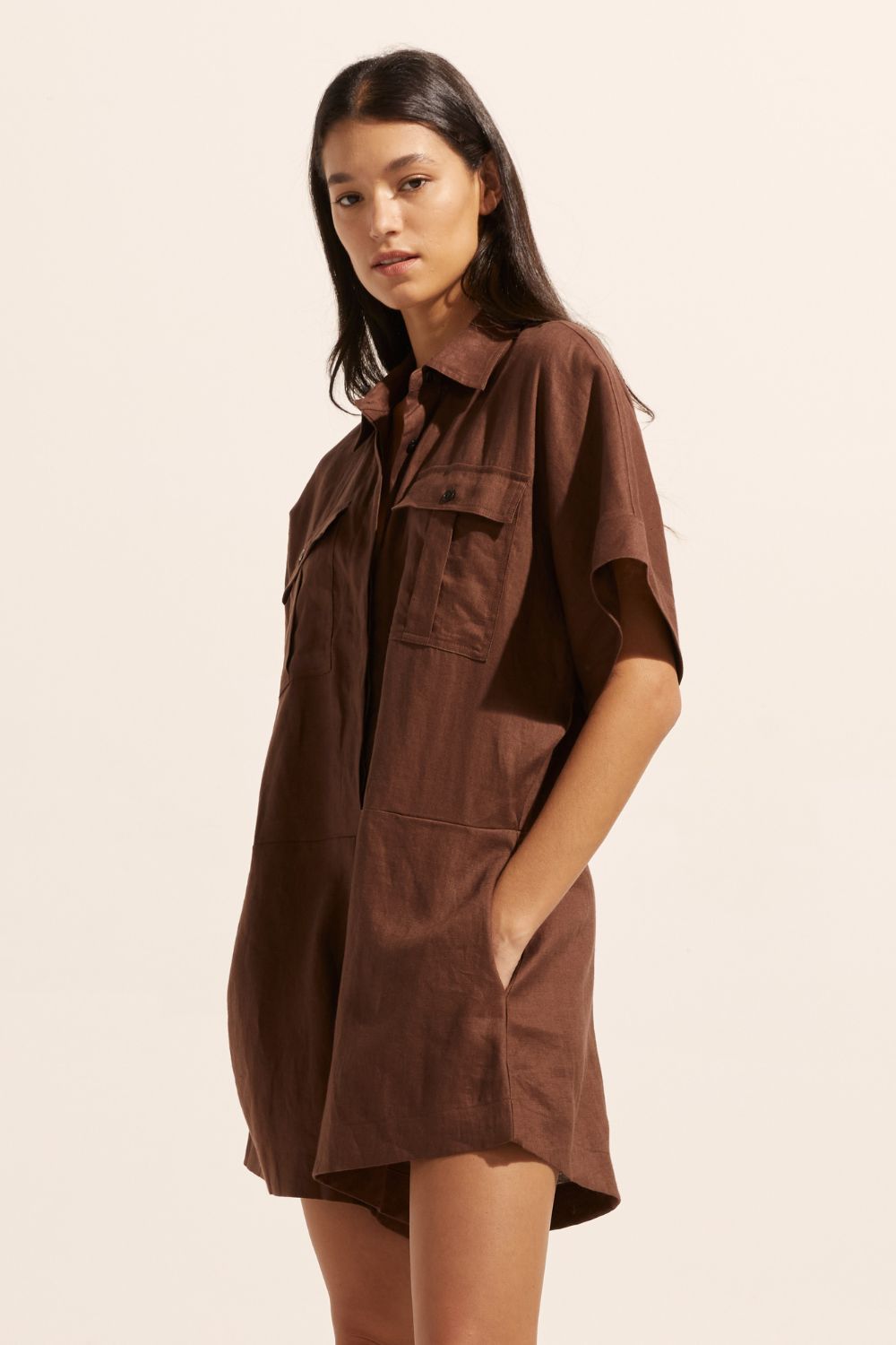 brown, jumpsuit, button down collar, oversized patch pockets, side view