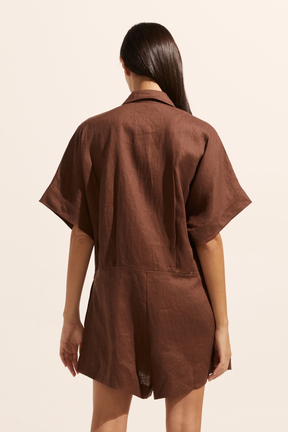 brown, jumpsuit, button down collar, oversized patch pockets, back view