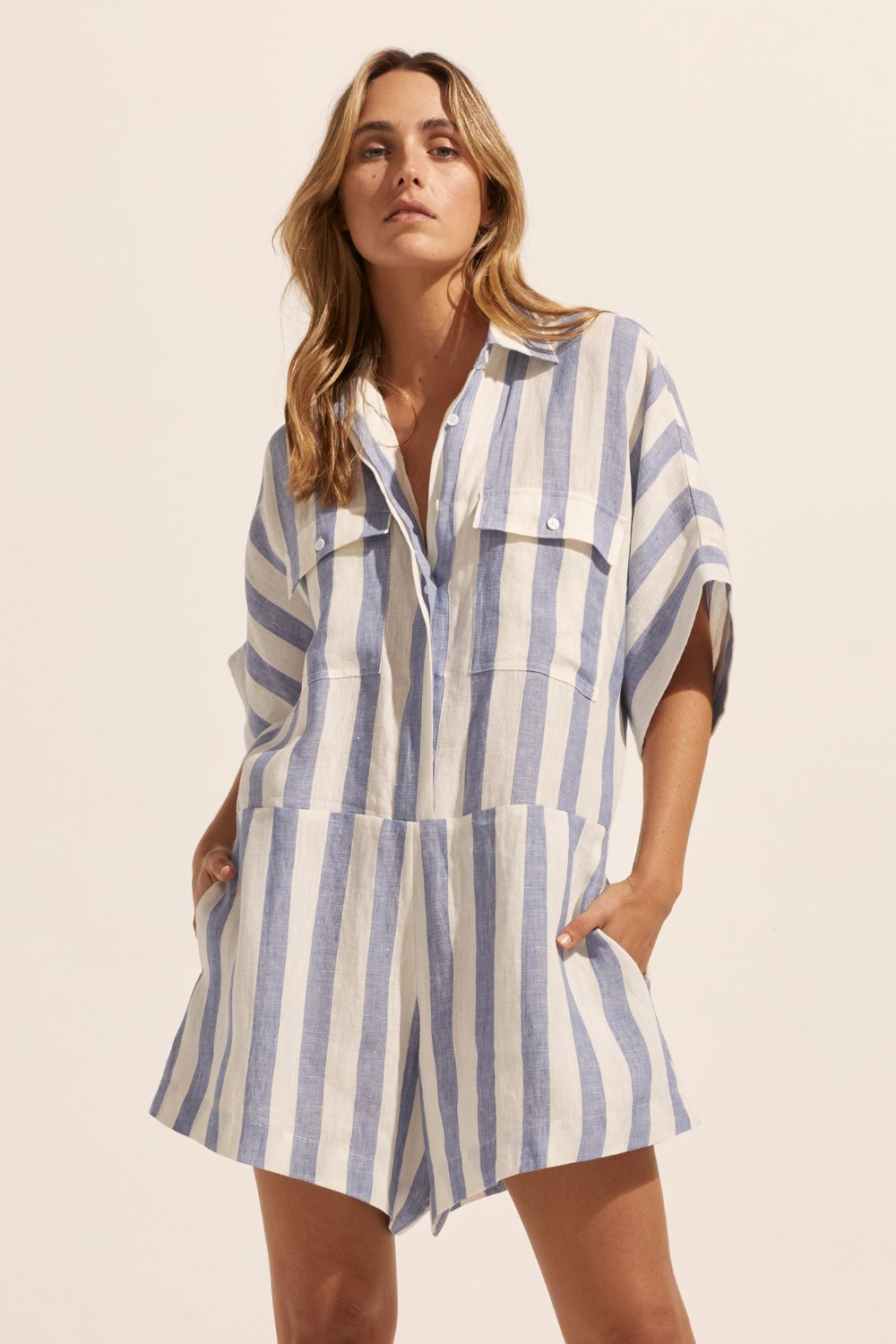 blue and white stripe, jumpsuit, button down collar, oversized patch pockets, front view