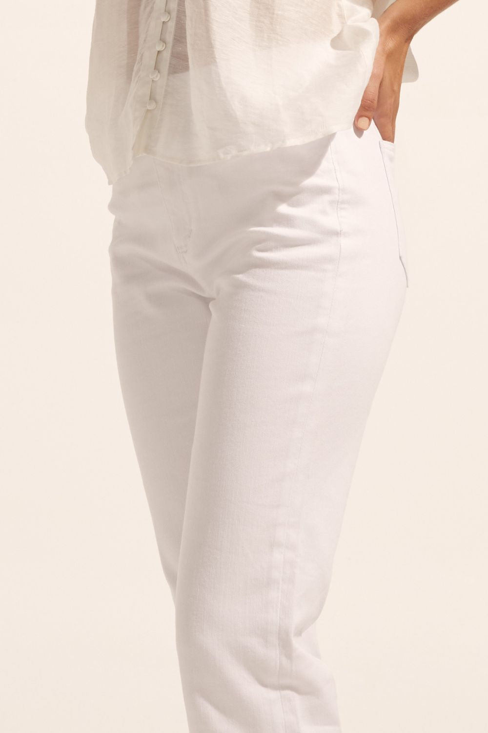 white, pant, cuffed jeans, mid rise jean, straight cut, close up image