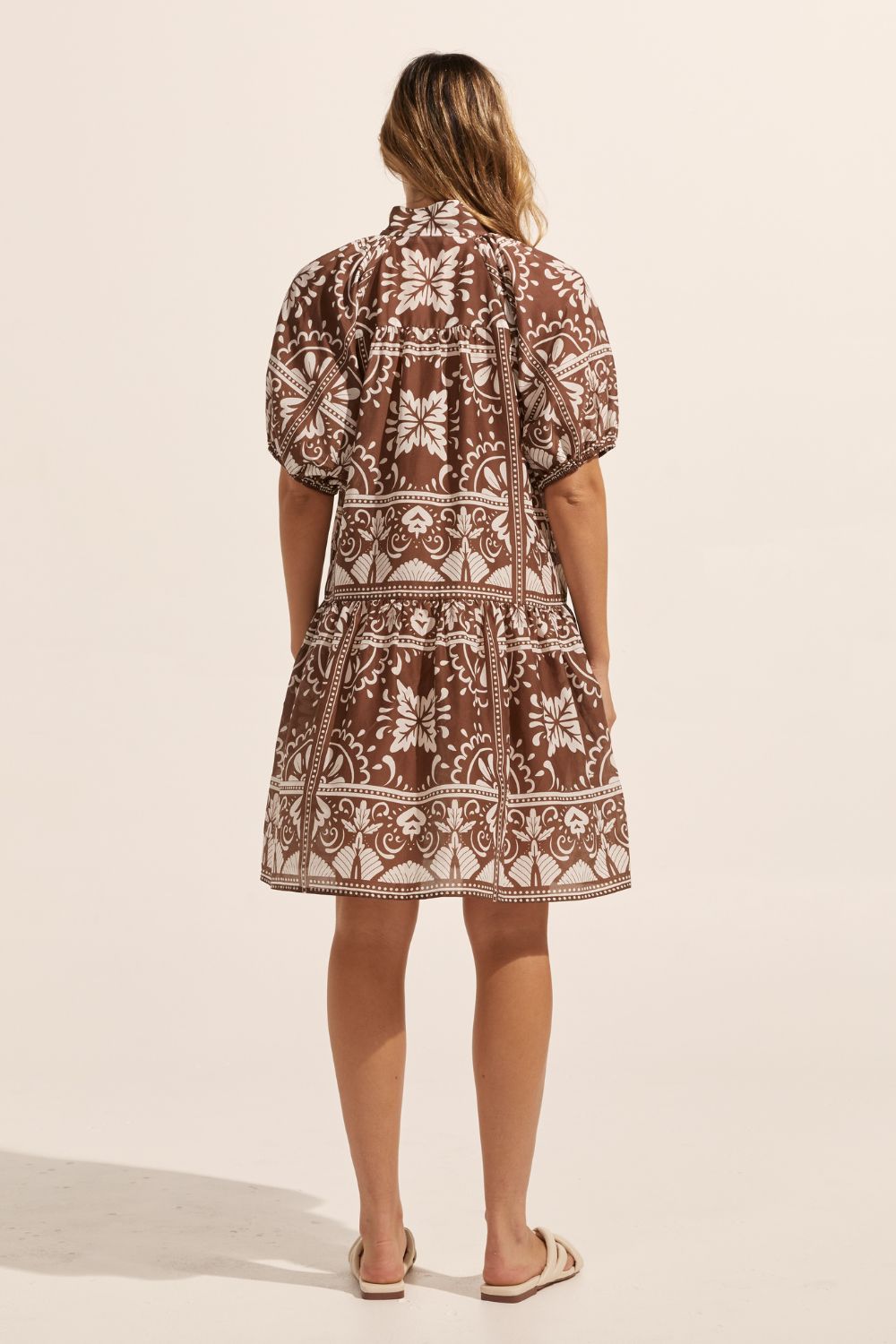 brown and white print, high neck, buttons to waist, mid length sleeve, dress, drop waist, back image