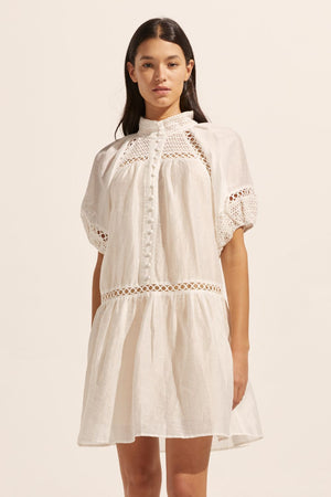 white, high neck, covered buttons, circular lace detailing, drop waist, mid-length sleeve, mini dress, front image