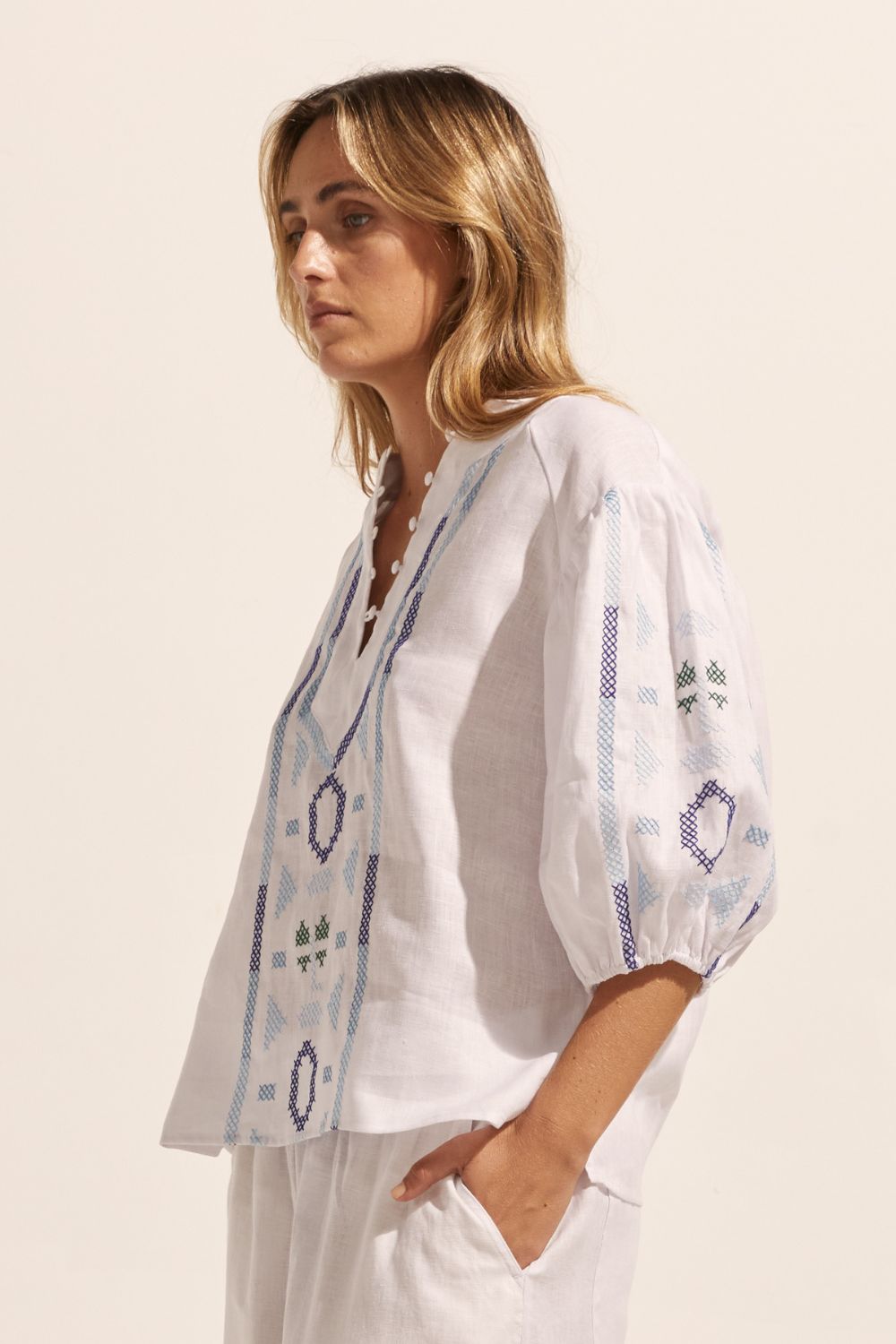 blue and white, top, mid length sleeve, button down neckline, embroidered, side image