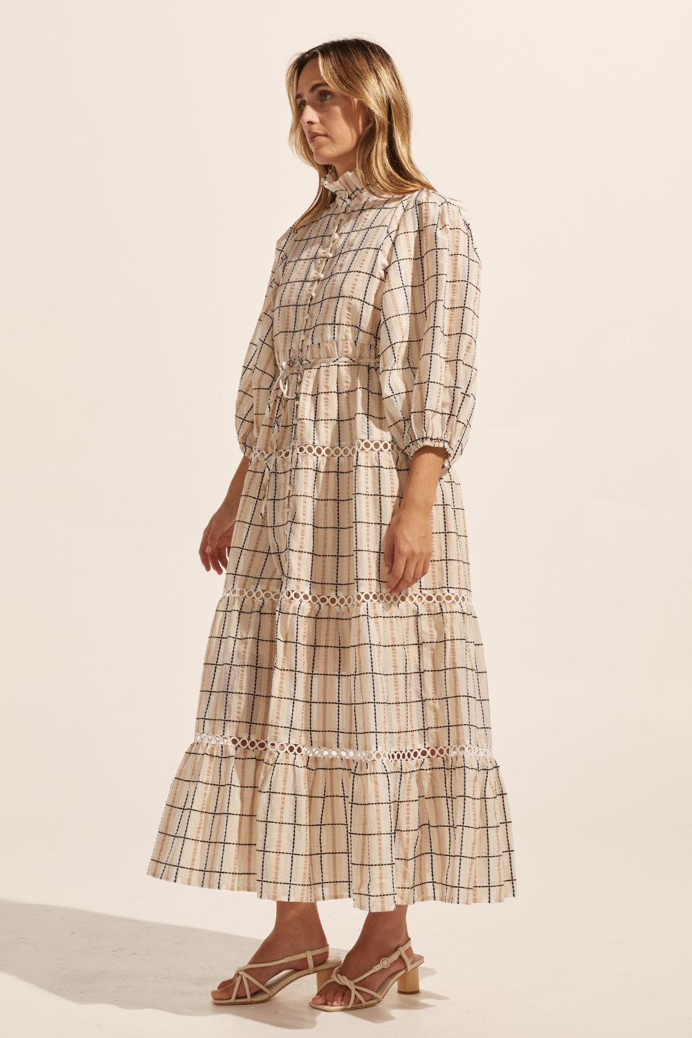 cream check print, dress, buttons through centre, ruffle collar, mid length sleeve, self tie fabric belt, midi dress, tiered skirt, side image