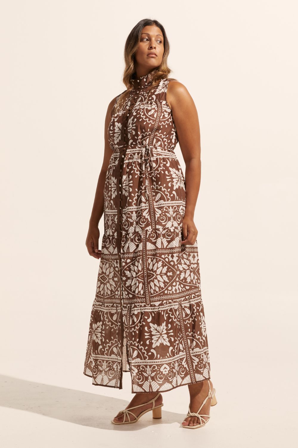 brown and white print, high neck, buttons down centre, thin fabric belt, sleeveless, dress, size 12 model wearing a size 1