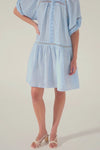 blue, high neck, covered buttons, circular lace detailing, drop waist, mid-length sleeve, mini dress, product video
